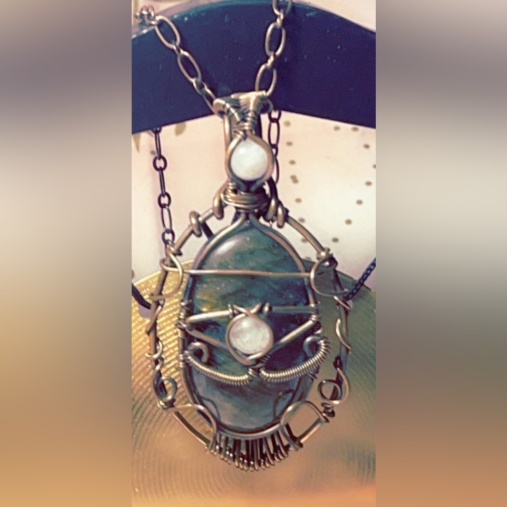 Eye of Horus wire wrap on 20”copper chain featuring Sunset Lab & Moonstone🌙